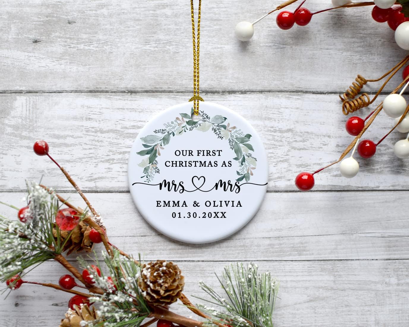 Andaz Press Personalized Our First Christmas As Mrs. & Mrs. Christmas Ornaments 2025 Foliage Wreath 2.8" Round Porcelain Ceramic Lesbian Christmas Ornament Married Couple Gay Women Newlyweds 1-Pack
